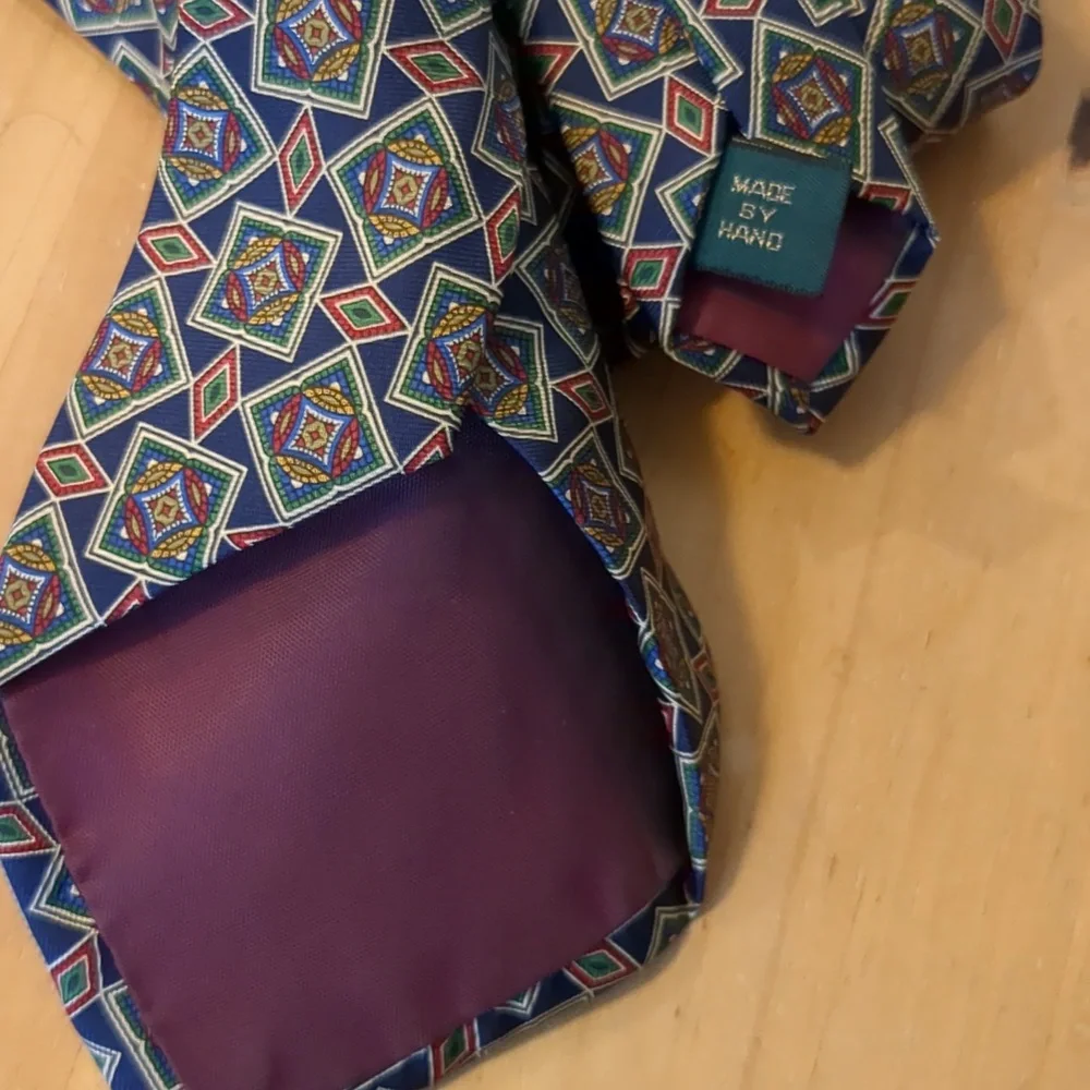 J. Crew 100 percent silk neck tie brown red blue gold Geometric